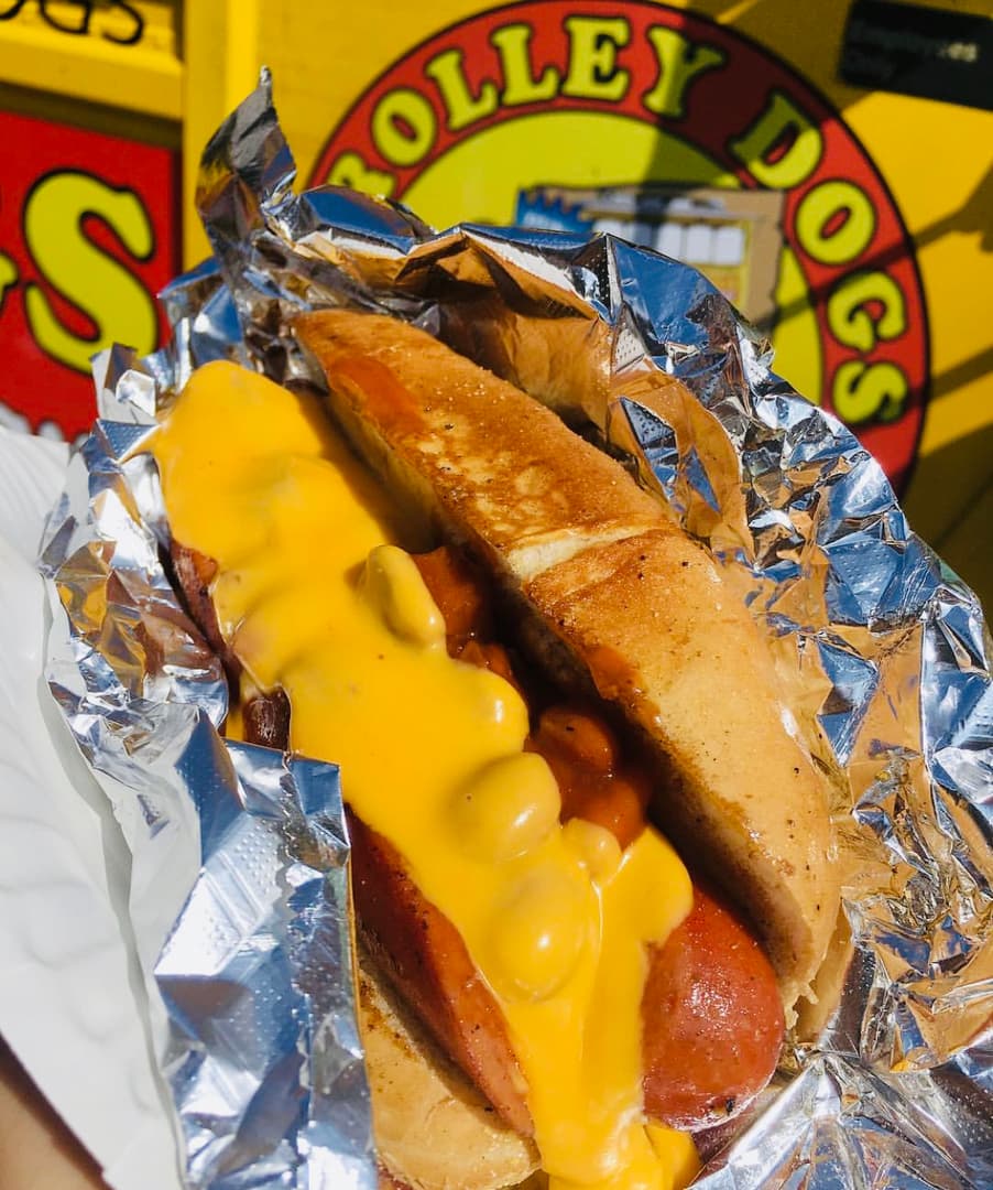 Trolley Dogs signature all-beef hot dog with toppings